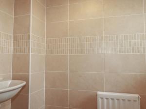 a bathroom with a toilet and a sink at Treveline in Bodmin +10 photos