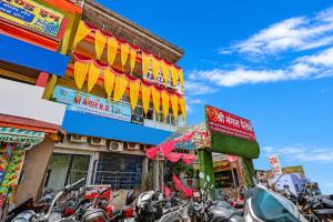 a group of motorcycles parked in front of a building at Shri Mangal Palace in Gwalior