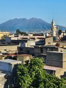 a view of a city with a clock tower at Sole raggiante Lia Darzillo in Afragola