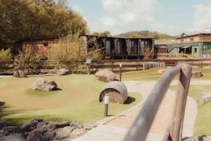 a miniature golf course in a zoo with rocks at Fun & Relax Park Thurnau in Thurnau