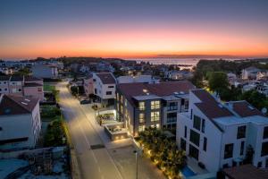 an aerial view of a city at sunset at Casa Seal by Briskva in Funtana