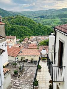 a view of a town from the balcony of a building at Borgo Izzo 2 in San Fele