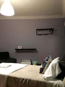 Postel nebo postele na pokoji v ubytování Apartment Lugo Rooms