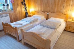 Cama o camas de una habitación en Challet Lovački Rog