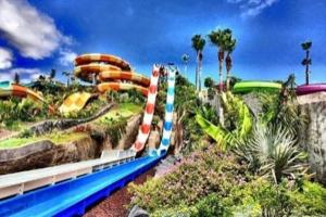 a water park with a water slide at Cosy Mareverde FREE WIFI by Olax Rentals in Adeje