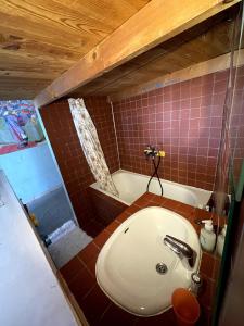 a bathroom with a sink and a bath tub at Midi À La Place in Rians +53 photos