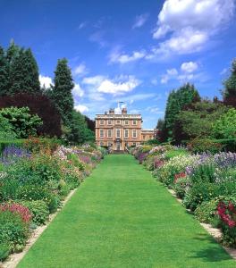 a large building in the middle of a garden at Chantry Cottage - Newby Hall, Ripon, North Yorkshire in Copt Hewick