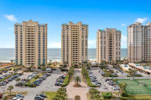 an aerial view of a parking lot with tall buildings at Beach Colony East 6B in Perdido Key