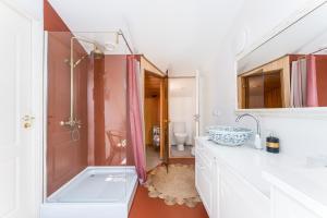 a bathroom with a shower and a sink at Rüütli Residents in Pärnu +66 photos