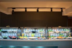 a display case filled with lots of different types of plants at Cleopatra Golden Beach Hotel in Alanya