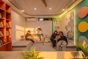 a group of people sitting in a room at Zostel Jaipur, MI Road in Jaipur +22 photos