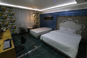 Postel nebo postele na pokoji v ubytování Inca Motel