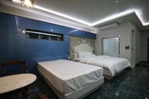 Postel nebo postele na pokoji v ubytování Inca Motel