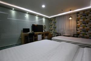 Postel nebo postele na pokoji v ubytování Inca Motel