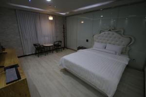 Postel nebo postele na pokoji v ubytování Inca Motel