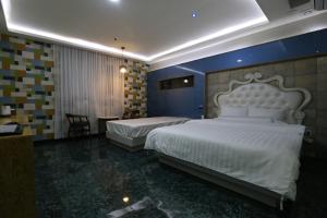 Postel nebo postele na pokoji v ubytování Inca Motel