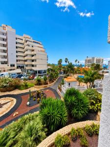 arial view of a city with buildings and trees at 213 Borinquen Holiday in Costa de Adeje