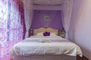 Postel nebo postele na pokoji v ubytování Greek Wonderland B&B