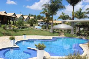 The swimming pool at or close to Pousada Serra Azul