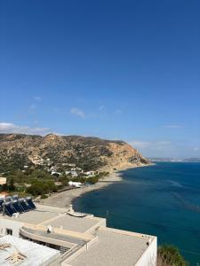 a view of a beach and the ocean at Pasiphae - Rooms for rent in Agia Galini