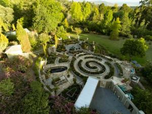 an aerial view of a garden with a spiral at Romantic Boutique Cottage in upper Hogsback in Hogsback