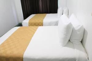 Ένα ή περισσότερα κρεβάτια σε δωμάτιο στο Union Hotel