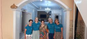 a group of women standing in an archway at Mubina Khiva B&B in Khiva