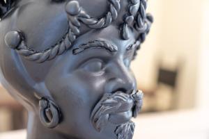 a close up of a statue of a woman at Viscuso House B&B in Aci Castello +22 photos