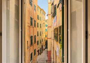 a view of an alley from a window at Iris 3: Un Fiore a Camogli in Camogli