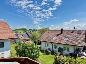 a view from the roof of a house at Ferienwohnung Wohlfühloase - gemütliche Familienunterkunft in ruhiger Lage in Achberg