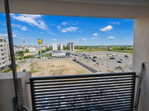a view of a parking lot from a balcony at Abel 24 Residence in Bacău