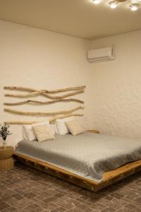 a bedroom with a bed in a room at Заміський комплекс Lisovi Polyany in Novosëlovka +35 photos