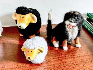 three stuffed animals of a dog and a sheep at Apartment Sassella 2a by Interhome in La Punt-Chamues-ch +17 photos