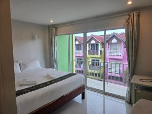 Katil atau katil-katil dalam bilik di Cha-Am Fish Star Hotel