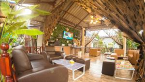 TV a/nebo společenská místnost v ubytování Nai C Resort