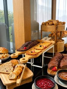a bakery with different types of bread and pastries at Wyndham Bogota in Bogotá