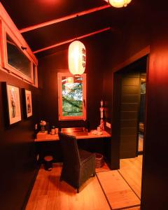 a bathroom with a sink and a window at Somn'en Bulle in Najac