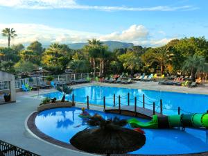 a view of the pool at a resort at Greenchalets Roquebrune Sur Argens in Roquebrune-sur-Argens