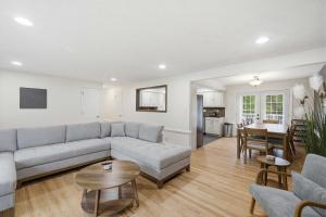 a living room with a couch and a table at Mason Ranch - Game Room in Mason