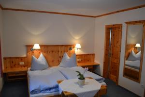 Ένα ή περισσότερα κρεβάτια σε δωμάτιο στο Haus Thurner