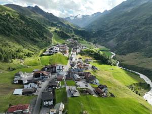 an aerial view of a village in the mountains at The Moss - Your unique hideaway in Obergurgl