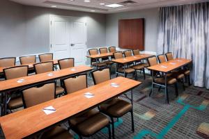 a conference room with wooden tables and chairs at Residence Inn Jackson Ridgeland in Ridgeland +42 photos
