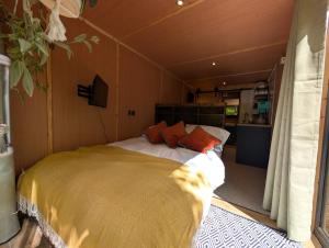 a bedroom with a large bed in a room at Bird Box in Carlisle