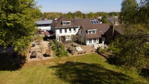 an aerial view of a large house at Villa De Musschenberg in Beek
