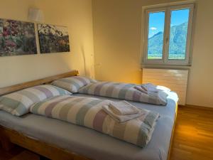two beds sitting next to each other in a room at Casa Kasia by HolAp SA in Contra