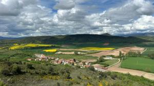 an aerial view of a village in the hills at Gaia Merindades in Salinas de Rosío