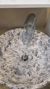 a wine glass sitting on top of a table at Apartment Max in Borovići