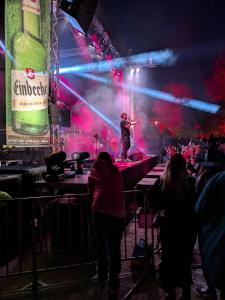 a man on the stage at a concert at Bocksbergbande in Goslar
