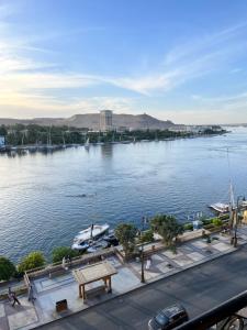 a view of a river with boats in the water at Nile View Studio Aswan in Aswan