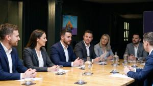 a group of people sitting around a table at The Blue Haven Hotel in Kinsale